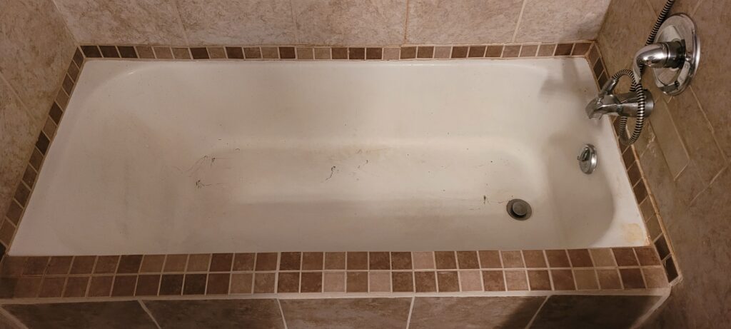 A dirty, old bathtub