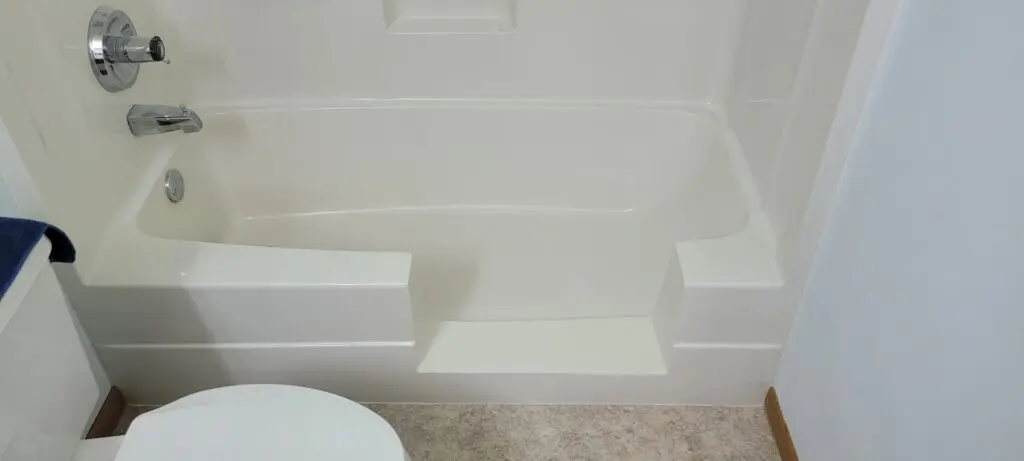 Bathtub with an opening